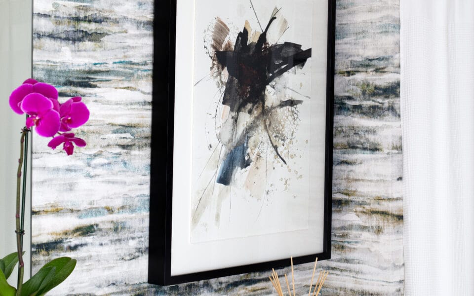 A piece of modern art on a colorful wall